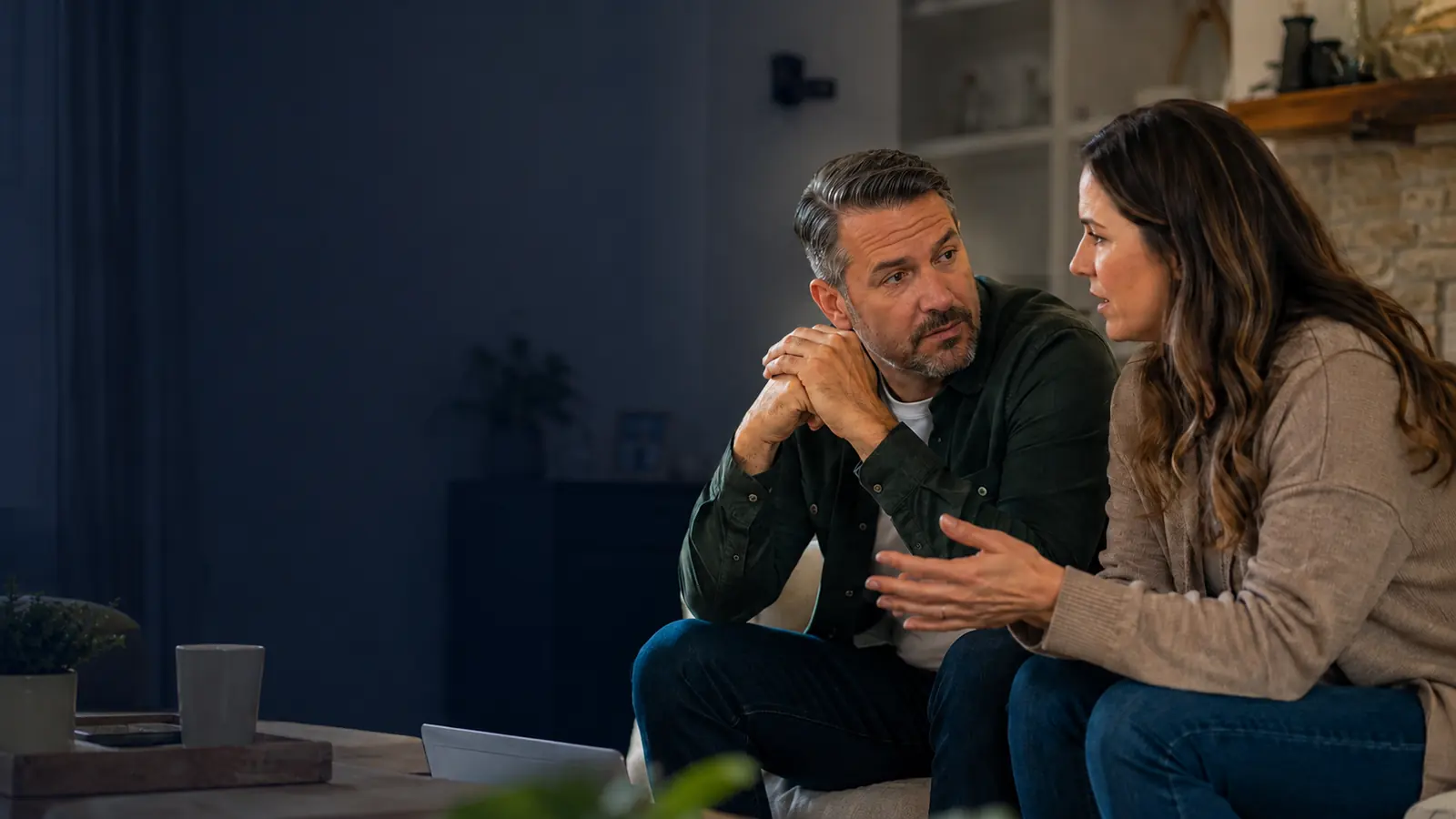 Couple reviewing life insurance options together at home
